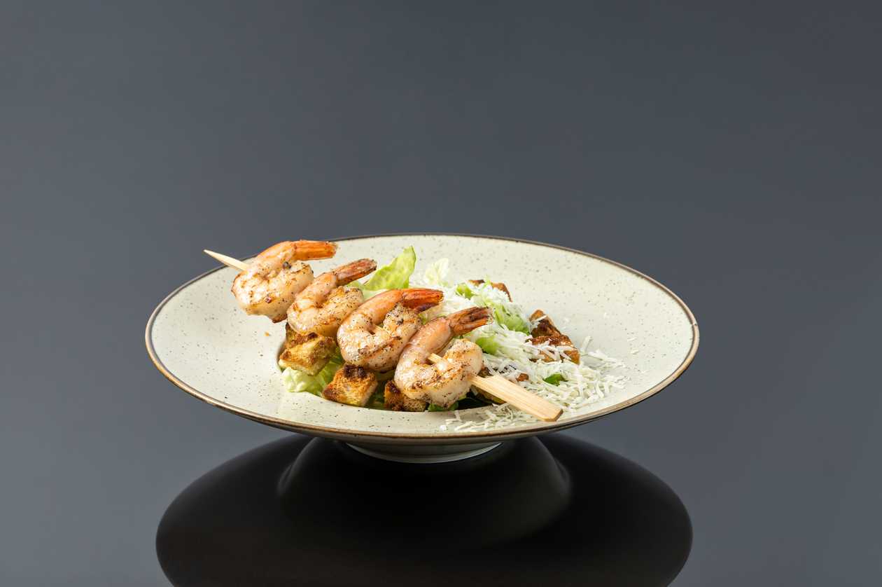 Caesar salad with prawns