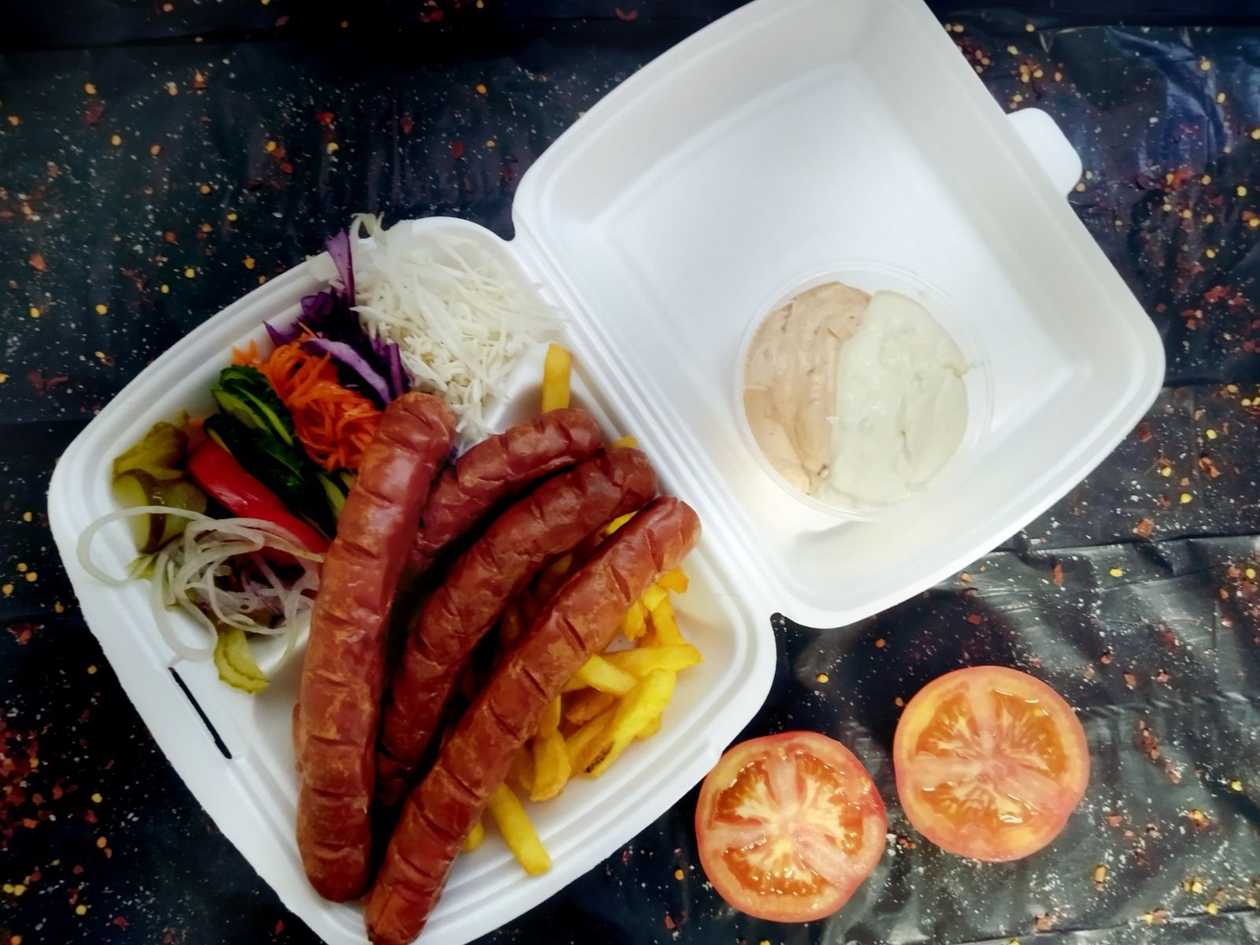 Grill sausages on a plate