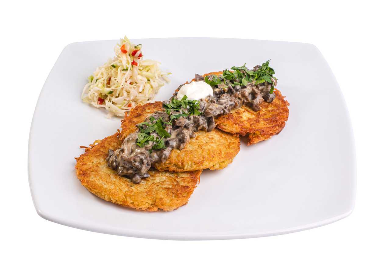 Placki Ziemniaczane z Sosem Pieczarkowym