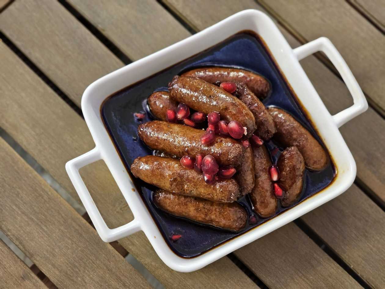 Makanek with pomegranate sauce