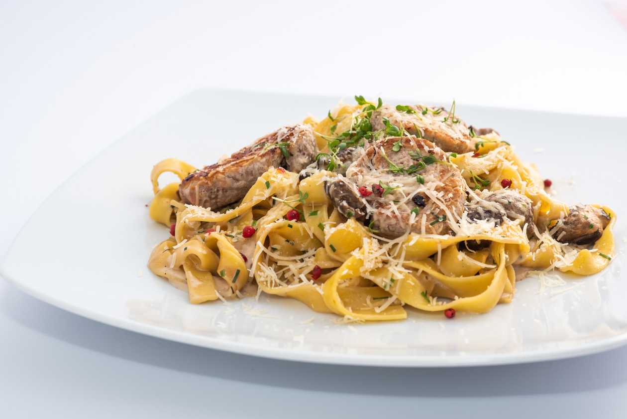 Tagliatelle on oak mushroom sauce with pork tenderloin