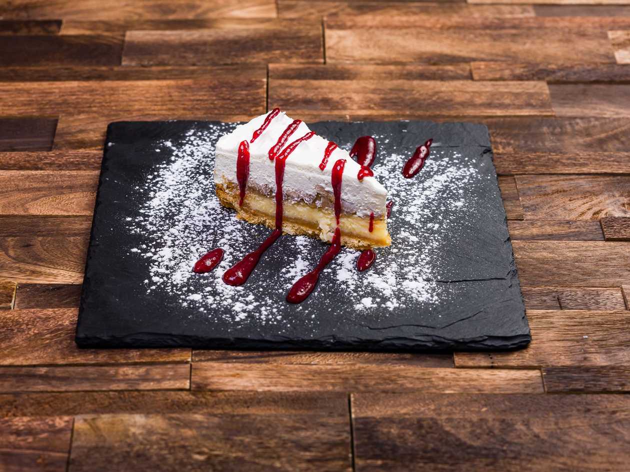 English Banoffee cake with wild berry sauce