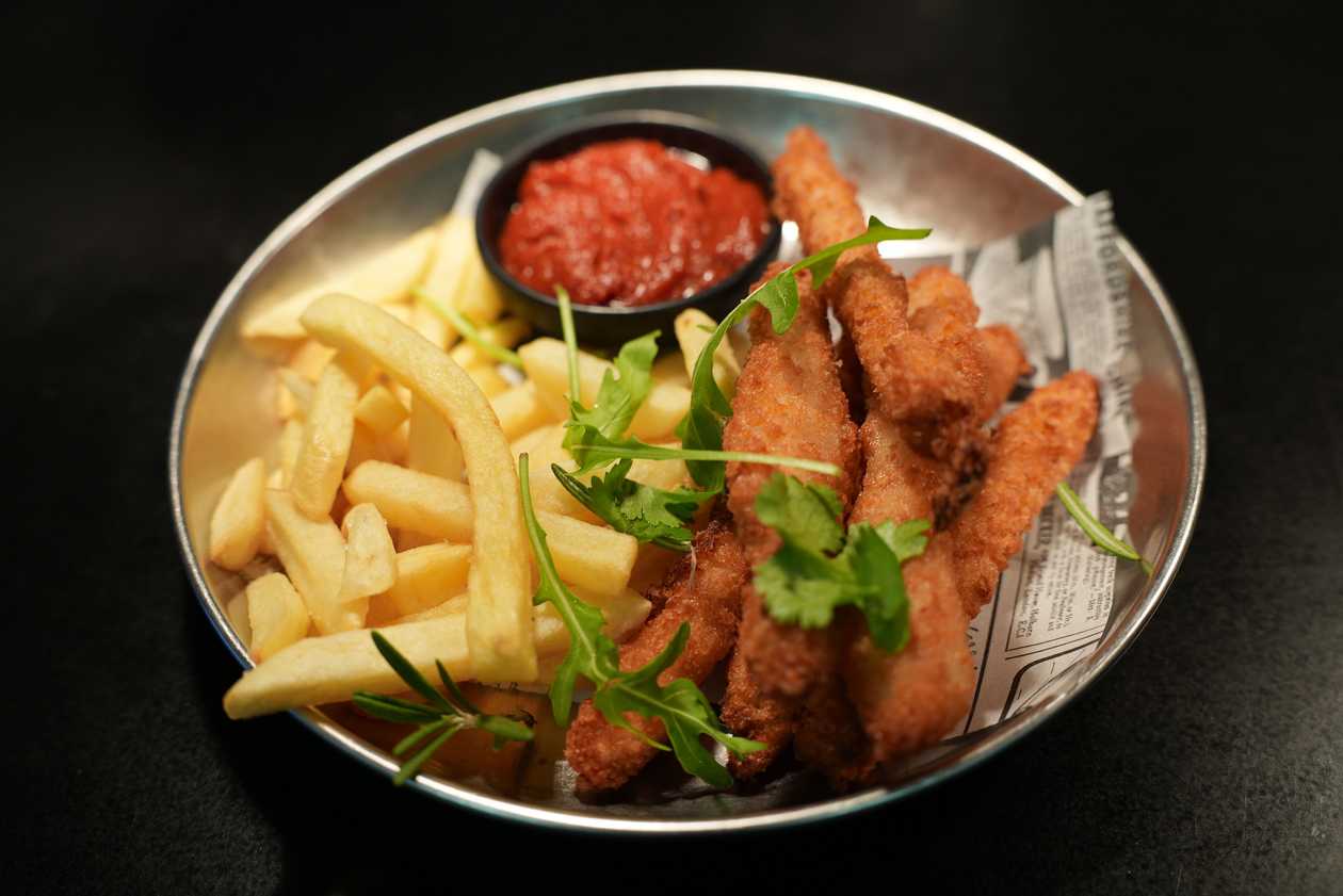 Crispy chicken strips with fries