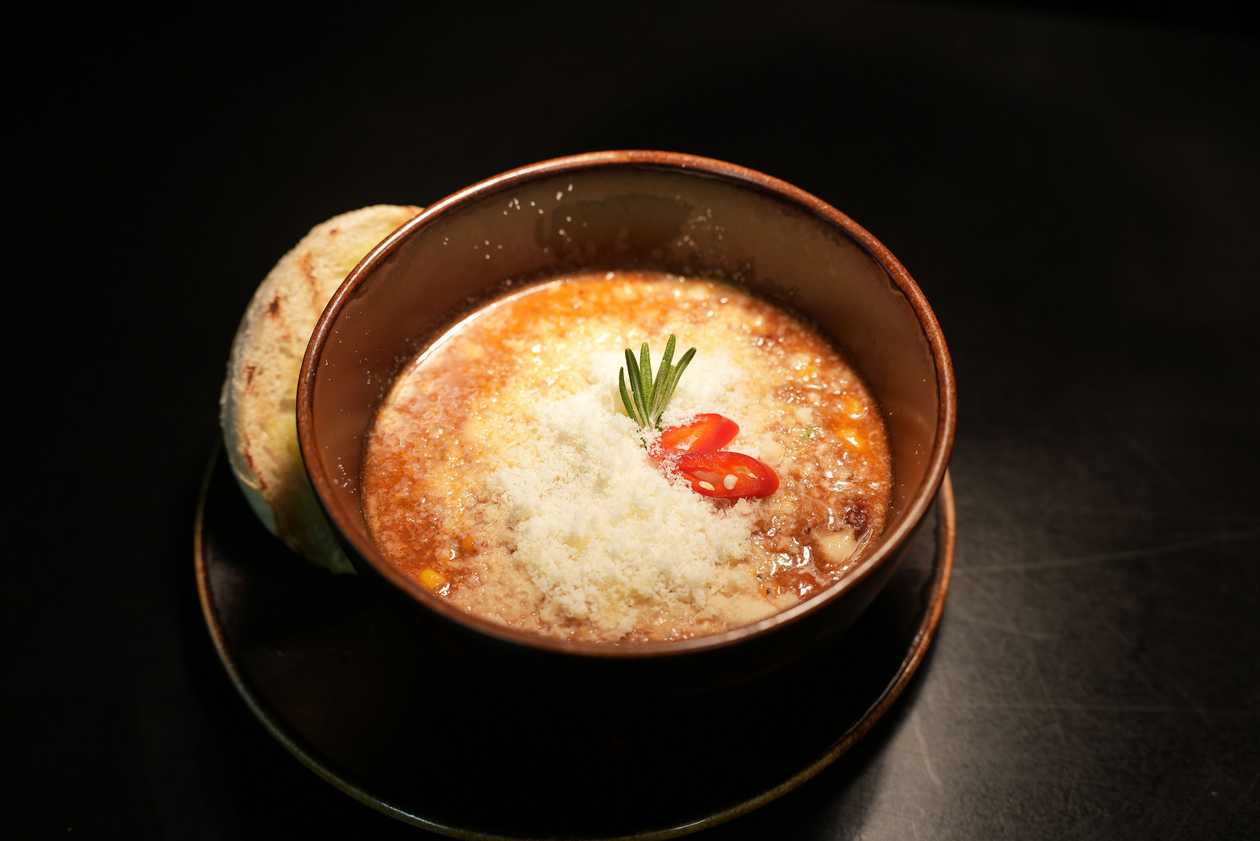 Spicy chili soup with cheese