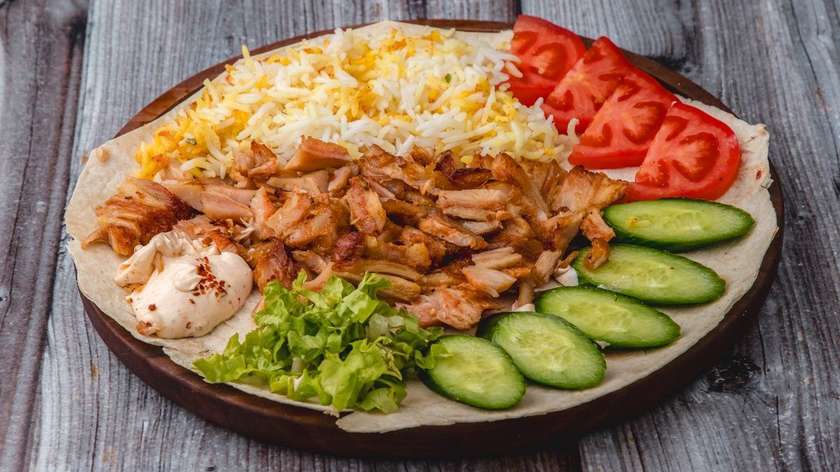 Doner with Chicken over Rice Pilaf