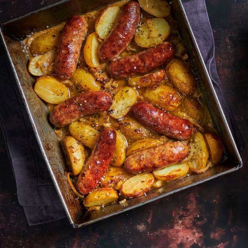 Spicy Vegan Merguez Sausages with Baked Potato Wedges and Cabbage Salad