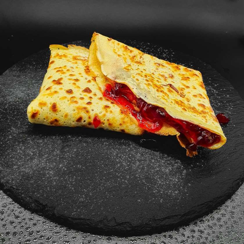 Crepes with strawberry jam