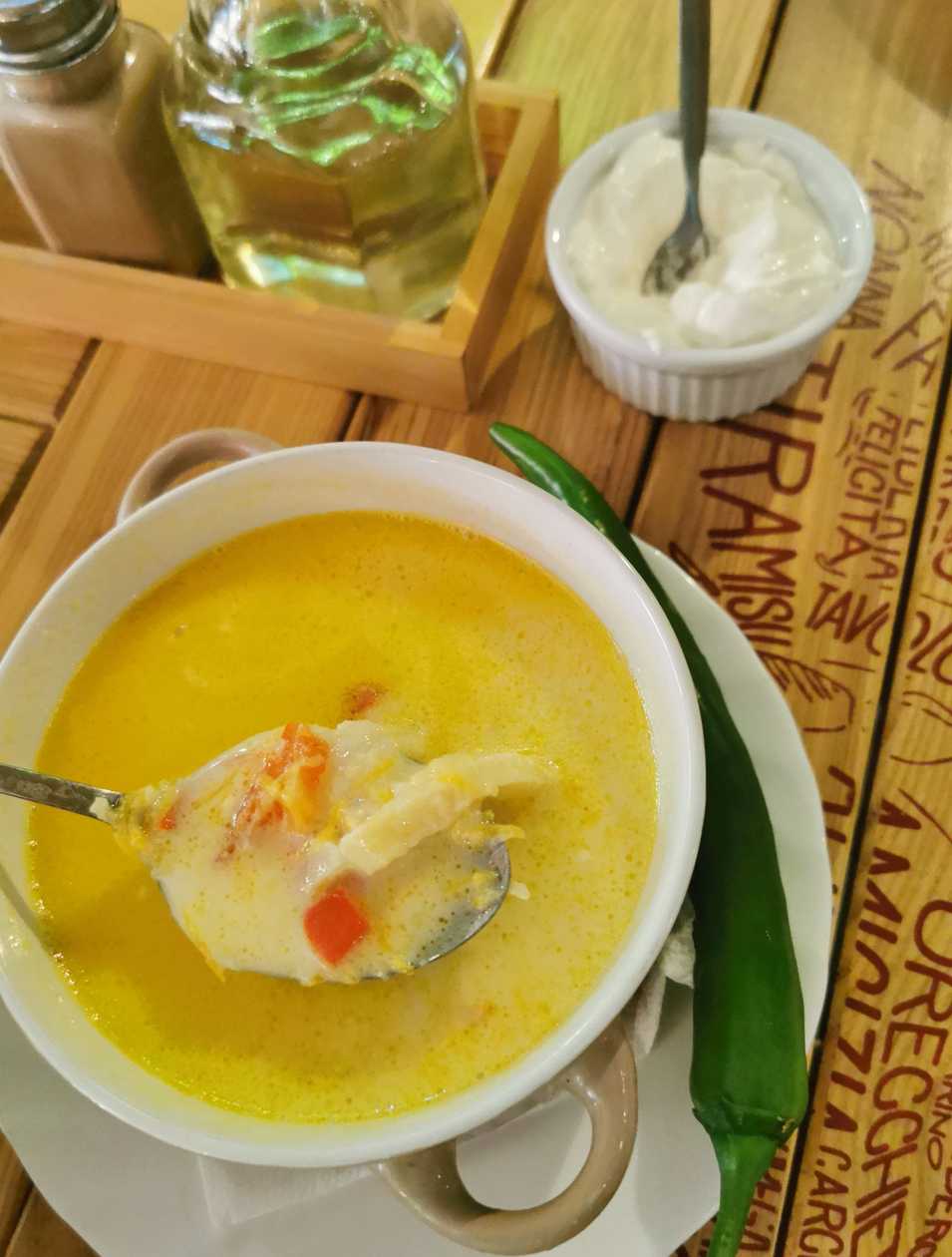 Tripe soup with sour cream and hot peppers
