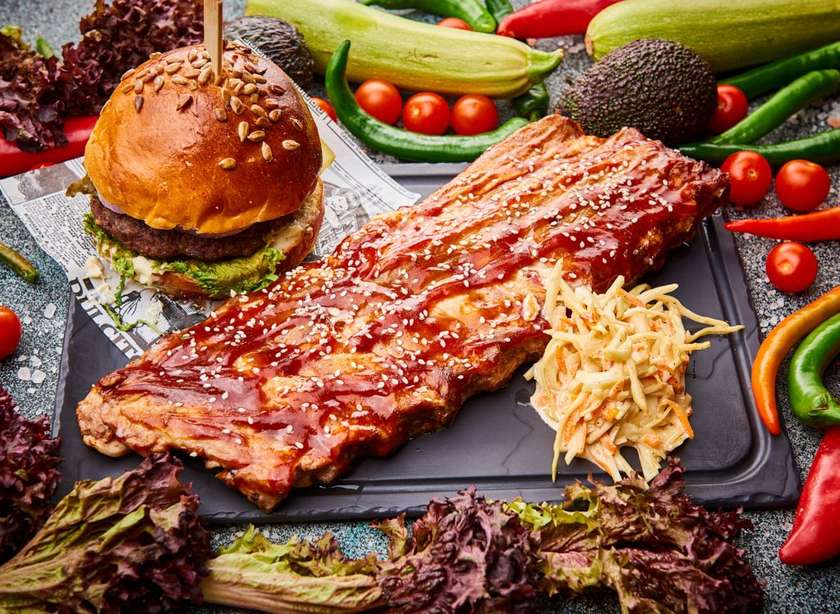 Slow-Cooked BBQ Pork Ribs with Sesame Seeds, served with French Fries