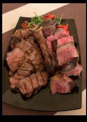 Tagliata con rucola e grana