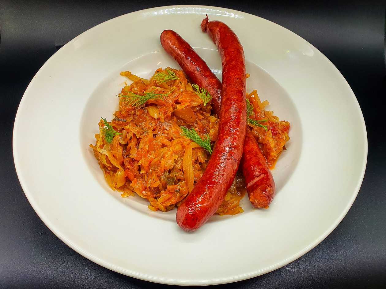 Sautéed cabbage with sausages