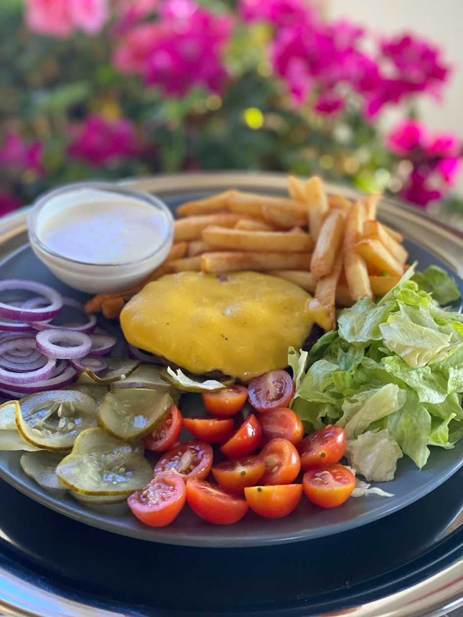Burger with marbled beef on a plate 400 g