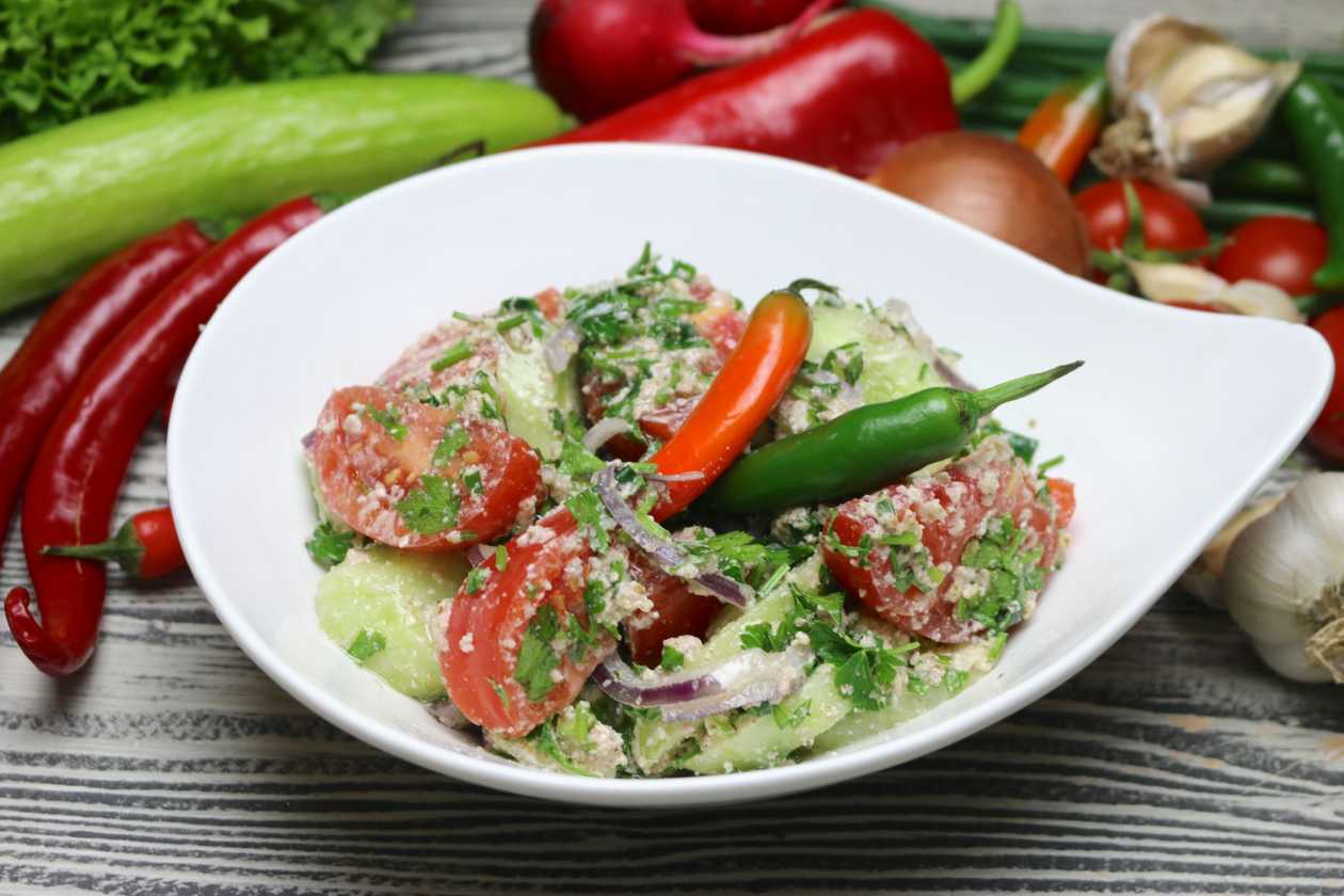 Cucumber tomato salad with walnuts