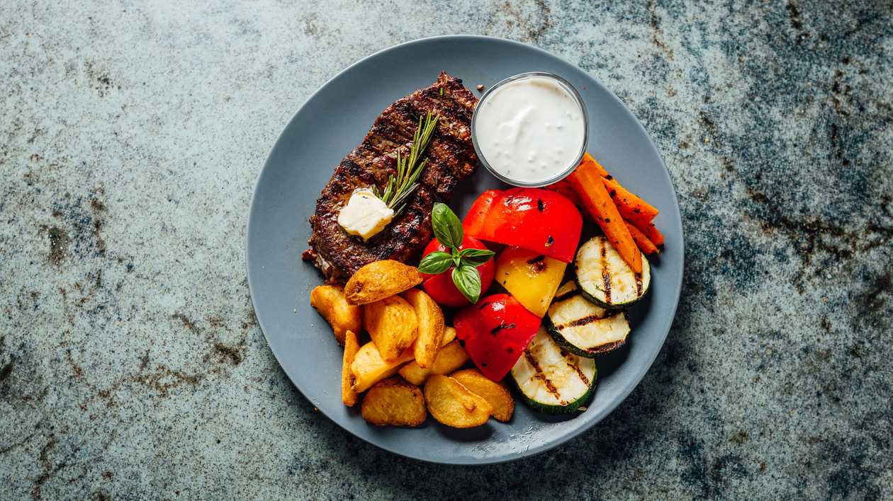 Beef Steak with Rosemary Butter and Potato Wedges 400 g