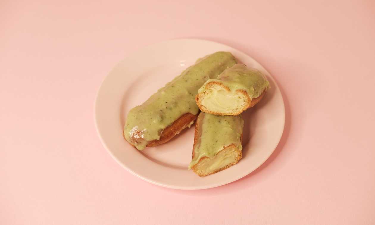 Éclair With Pistachio Cream And White Chocolate Glaze