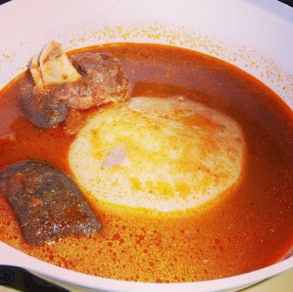 Fufu and Salmon with Groundnut Soup