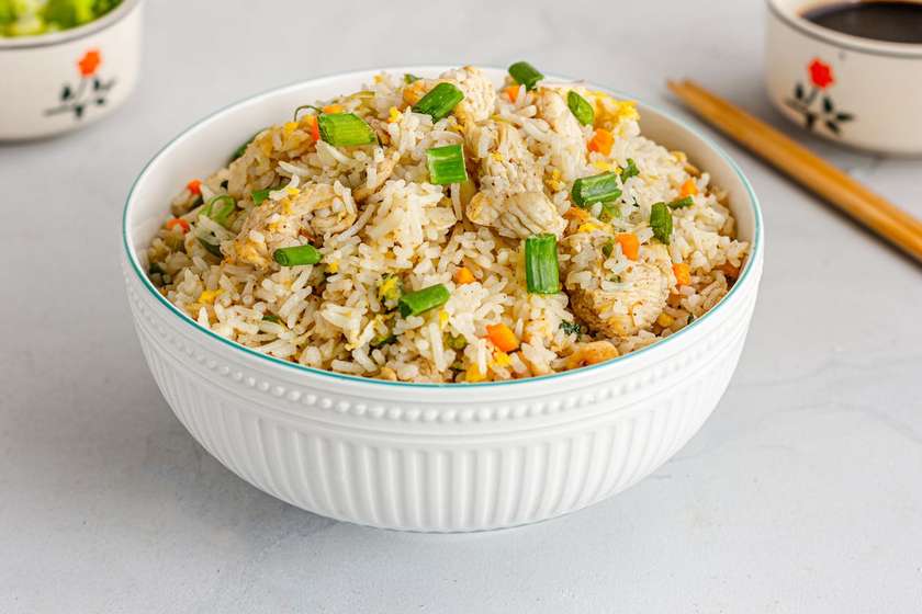 Fried or Jollof Rice with Chicken Sauce