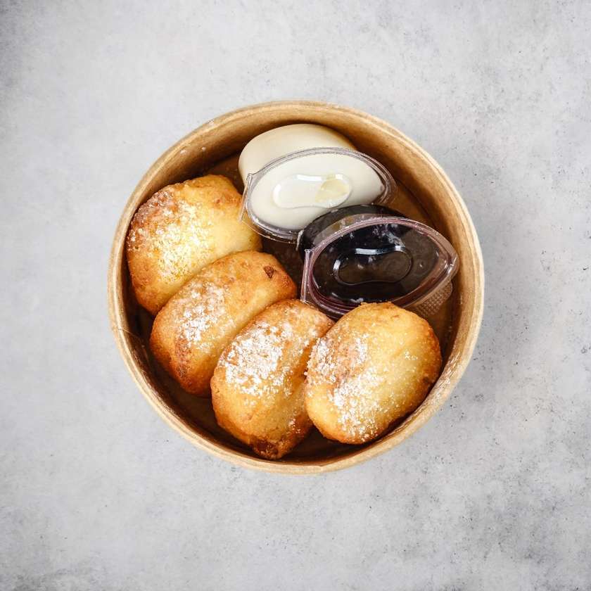 Syrnyky with sour cream
