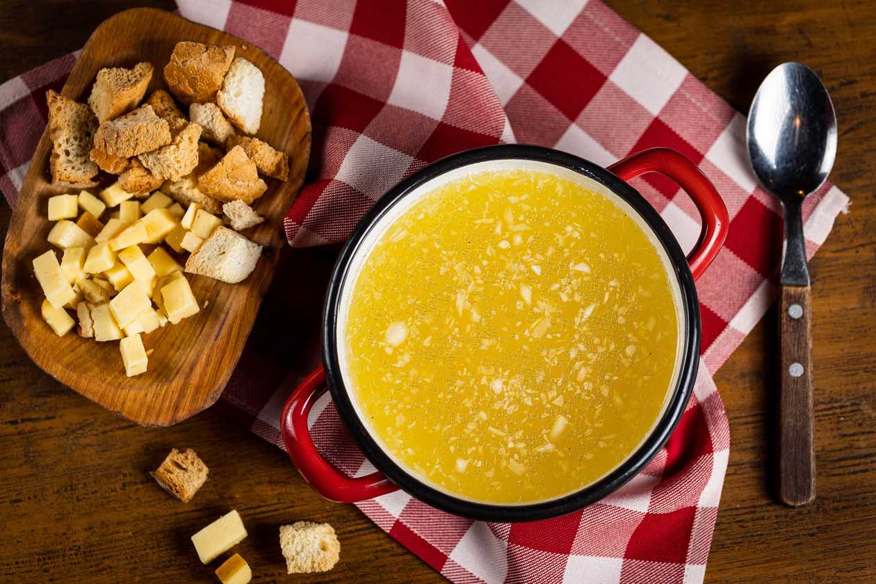 Garlic soup with fried bread and cheese