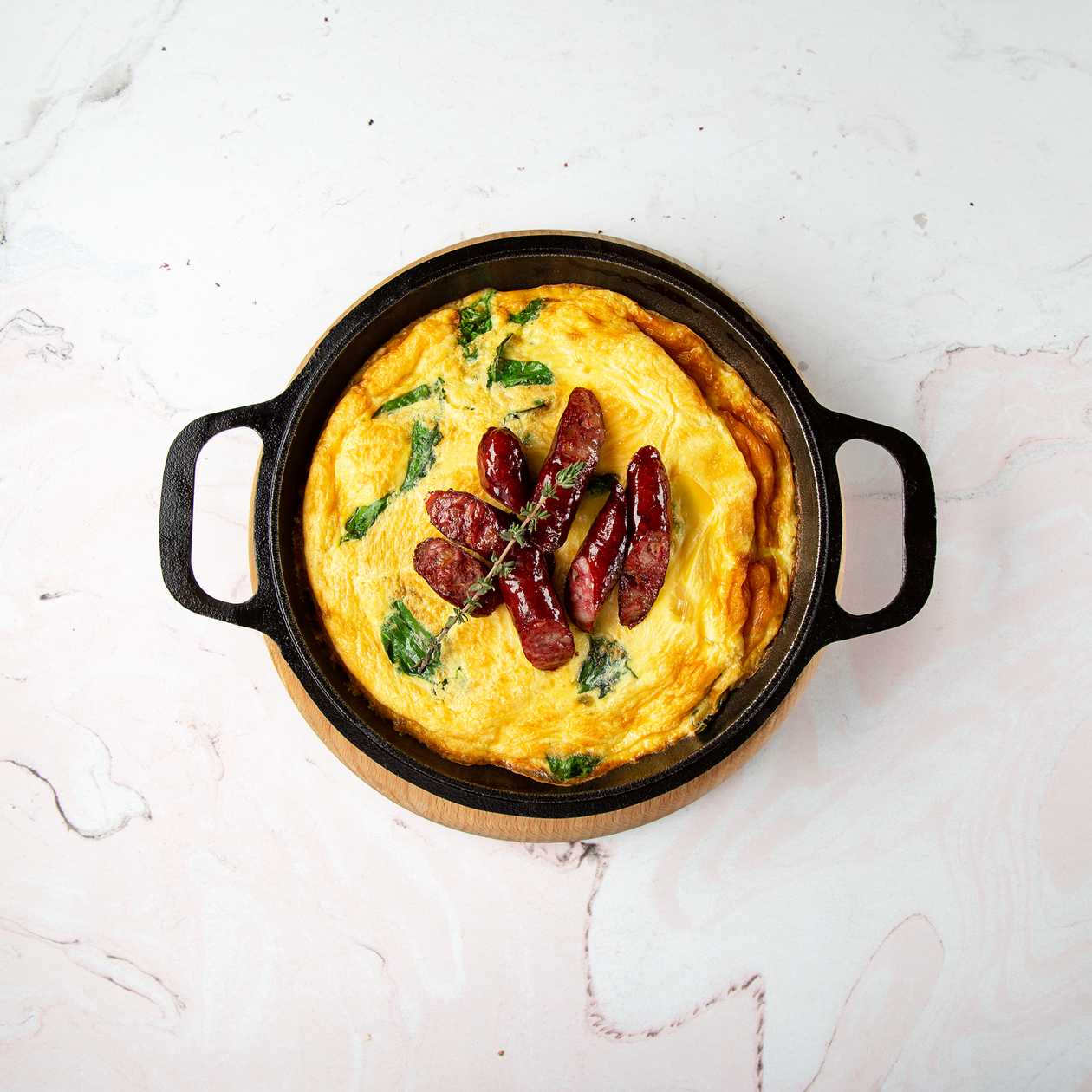 Baked Omelet with Beef Sausages and Spinach
