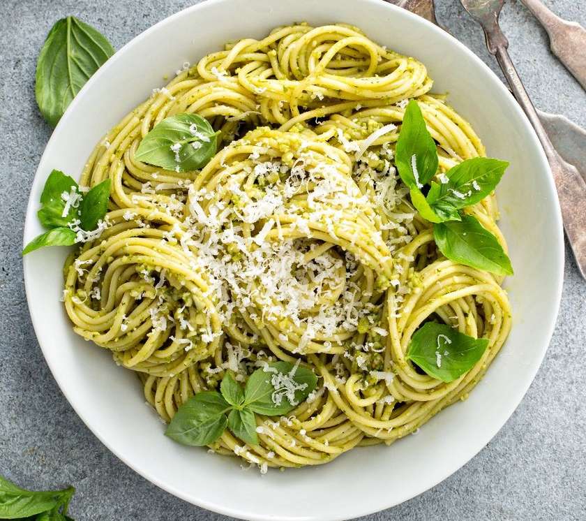 Smoked salmon with green noodles and olives