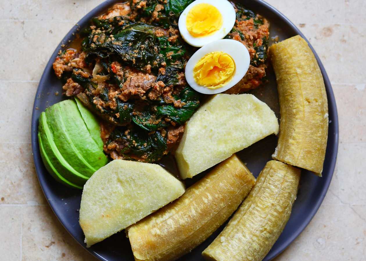 Bodie Ampesi With Kontomire Stew and One Egg