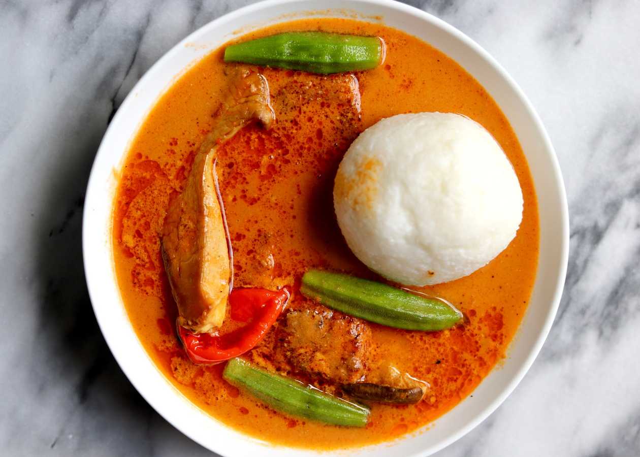 Three Balls of Rice with Groundnut Soup and Mixed Meat