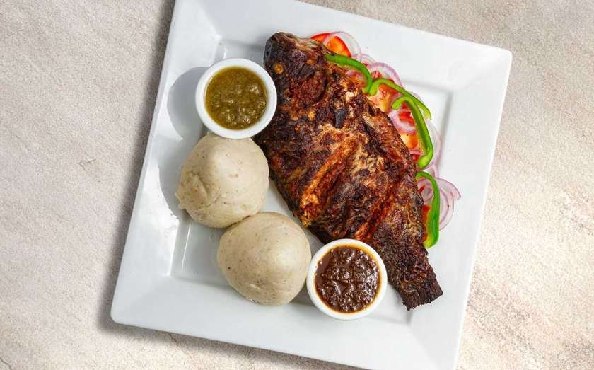 Two Balls of Banku with Tilapia and Chicken