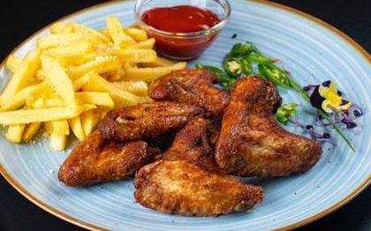 4 wings on the embers + potatoes + 1 sauce
