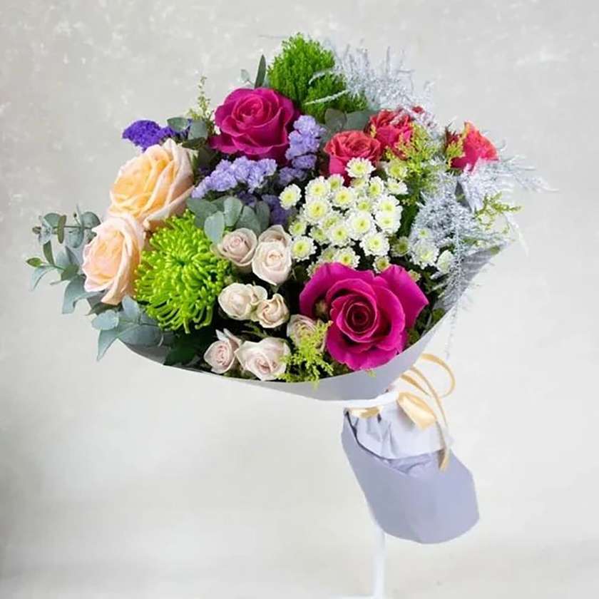Different roses and chrysanthemums mix