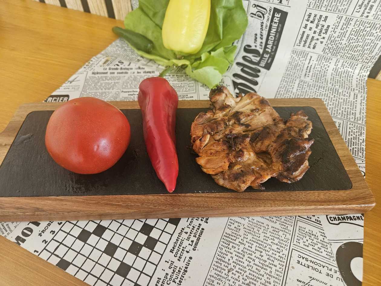 Chicken thigh on charcoal