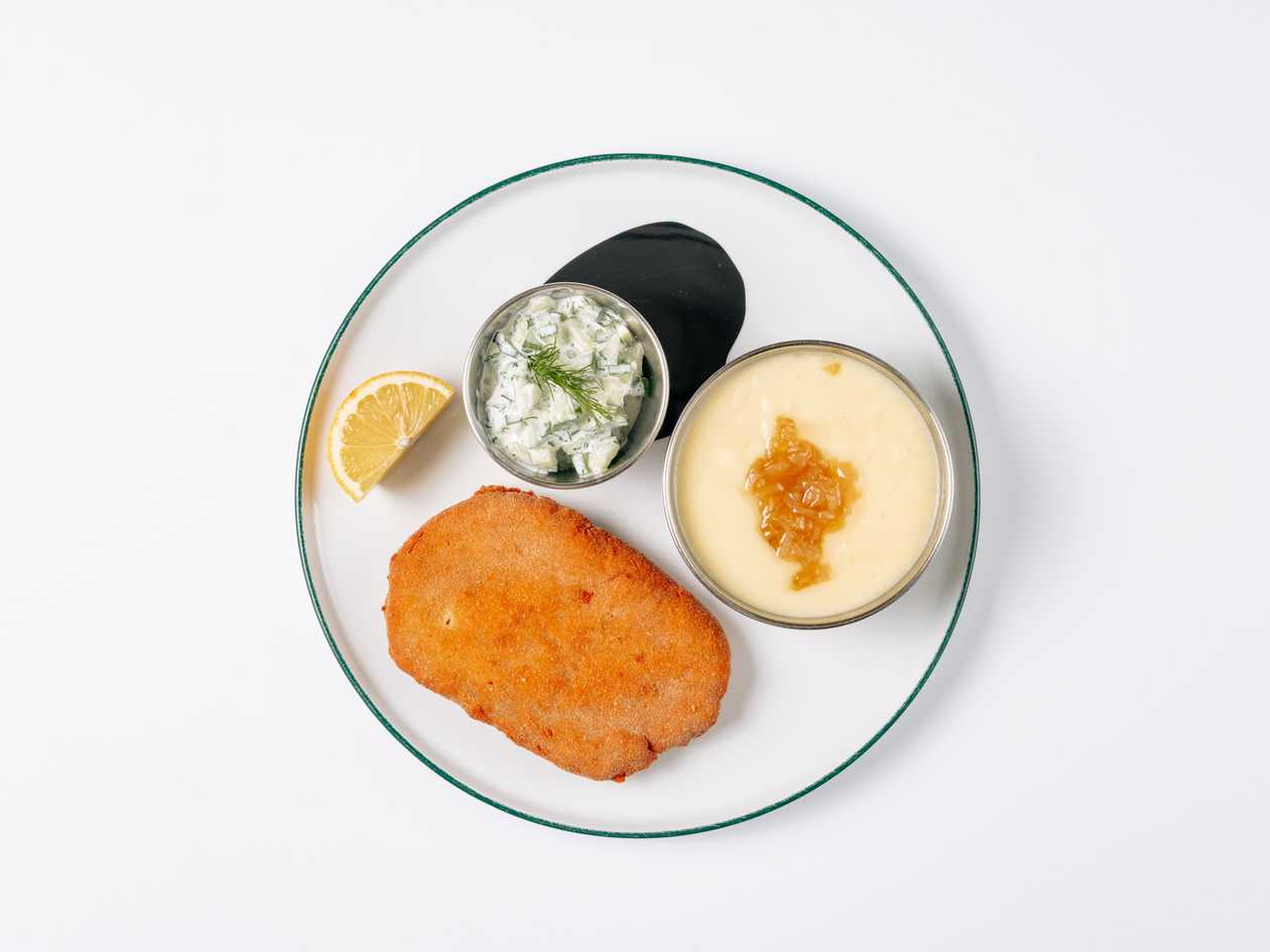 Chopped pork schnitzel with cheese, cucumber with yogurt and dill, and mashed potatoes baked in salt with onions fried in duck fat