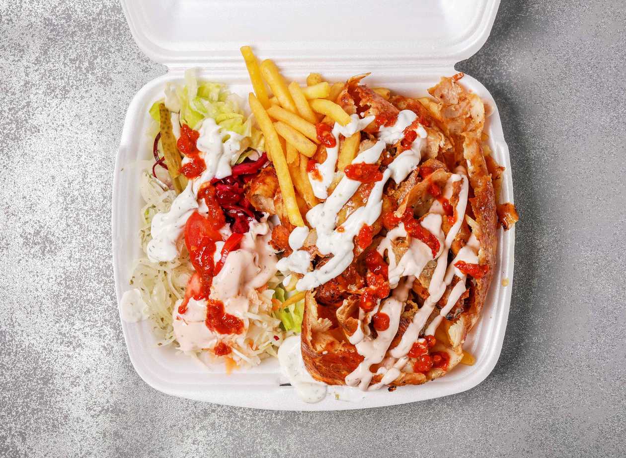 Kebab on a plate with bread
