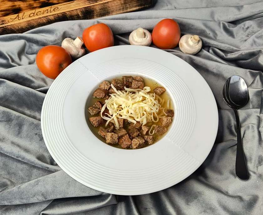 Garlic soup with cheese and croutons