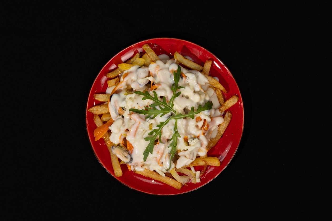 Poutine з мідіями