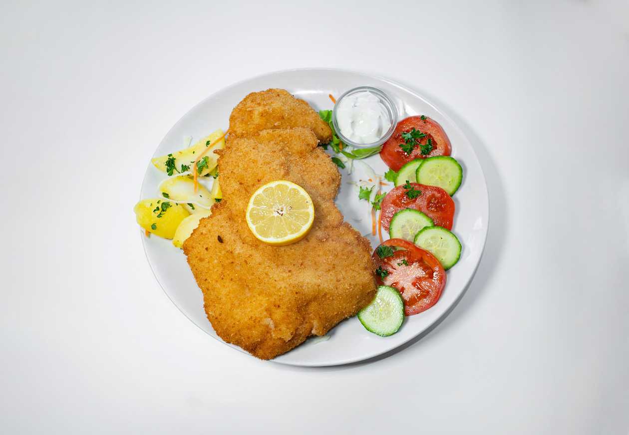 Fried Chicken Schnitzel, Boiled Potatoes, Vegetable Garnish, Tartar Sauce (1,3,12)