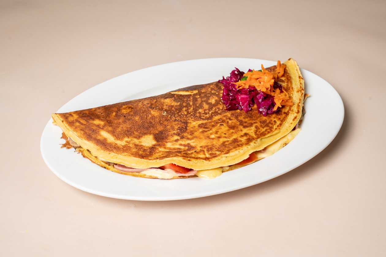 71. Bacon, Ham, Cheese, Mushrooms Sautée, Tomato, Mustard Sauce Crepe
