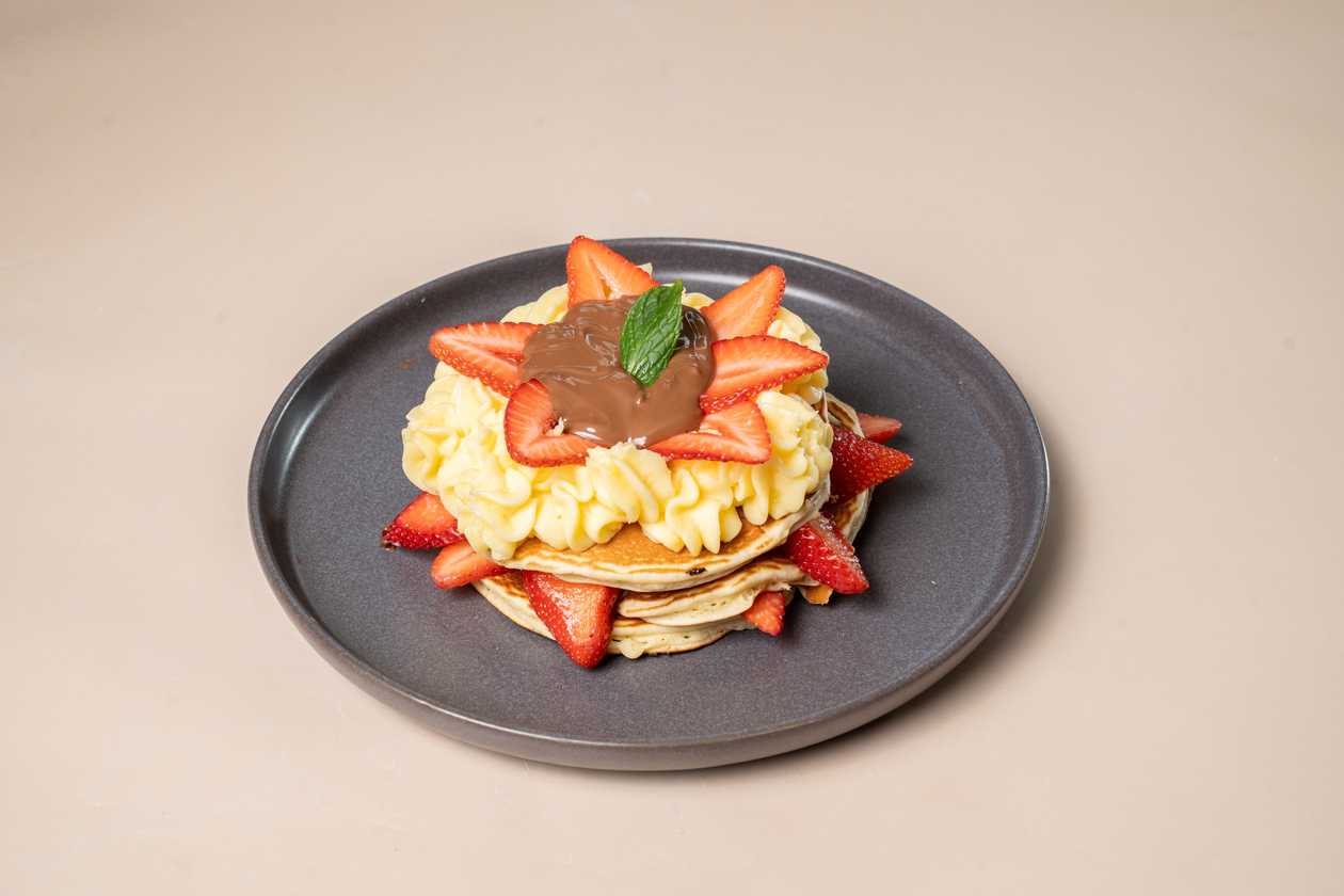 61. Praline Chocolate, Strawberries, Vanilla Cream Pancakes