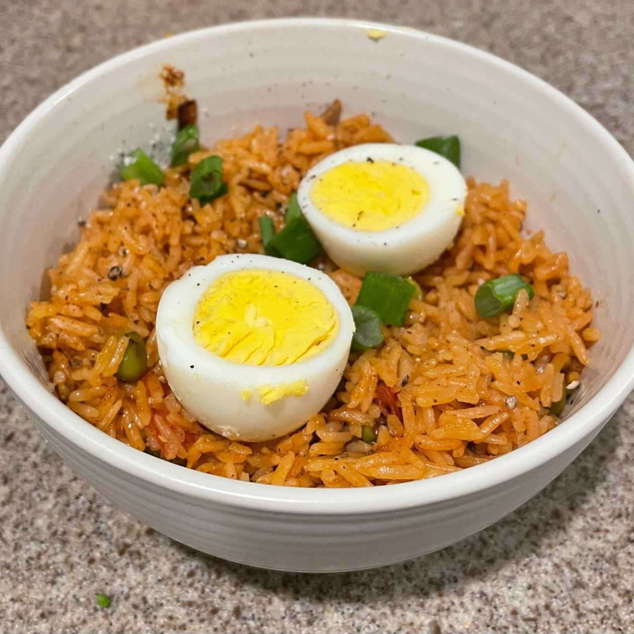 Jollof Rice Served with Eggs