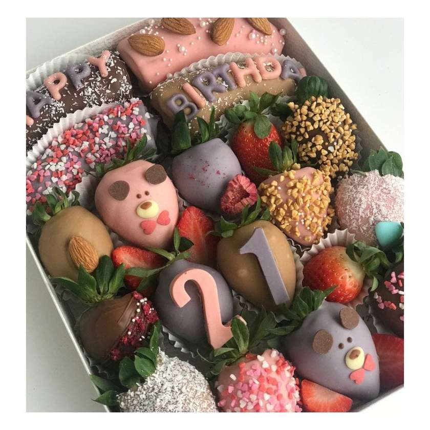 Box of fresh strawberries and bananas "Happy birthday"