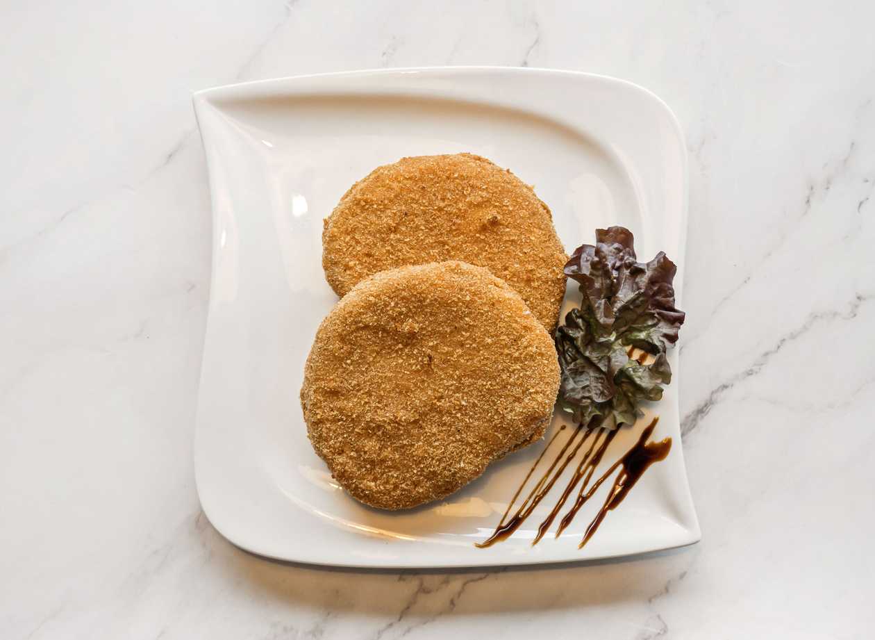 Fried Olomouc cheese, spicy sauce