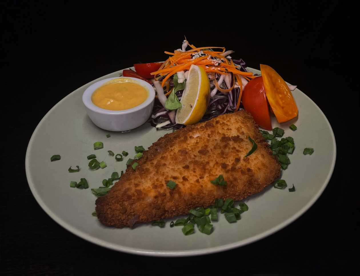 Breaded Baltic cod fillet with potato frites and tartar sauce