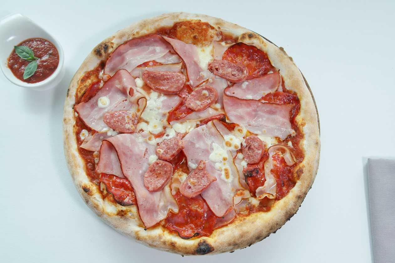 Pizza quattro carni