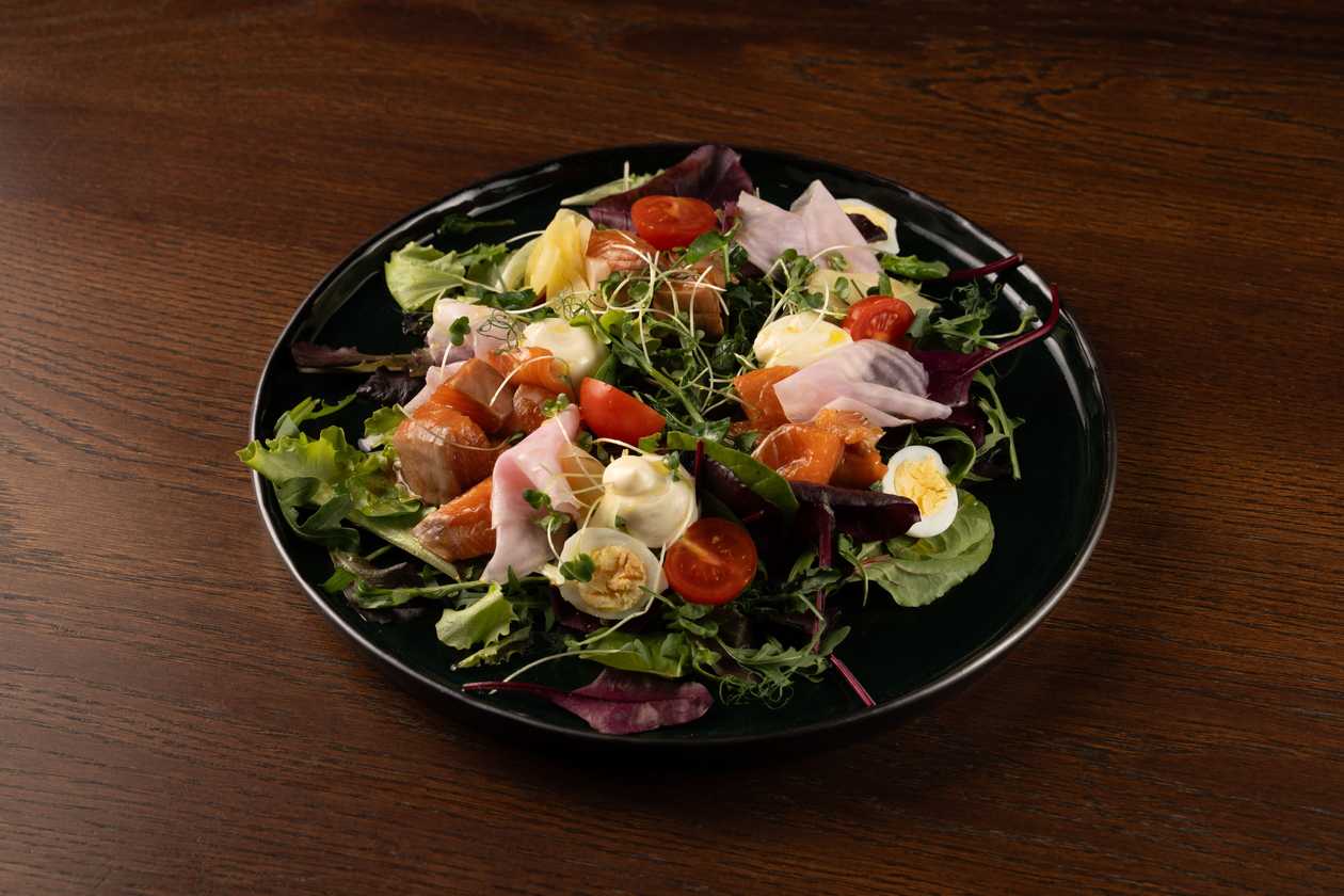 Salmon salad with pickled rainbow beets