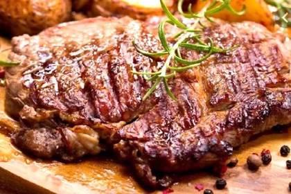Grilled Beef Chop with Fries and Creamed Spinach