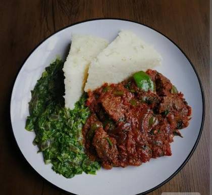 Fried liver served with ugali