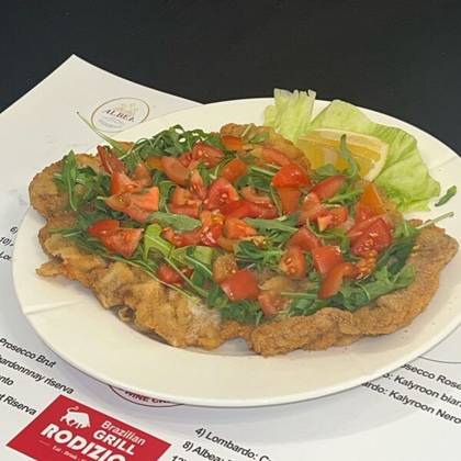 Snitel maxi de pui cu rucola si rosii cherry