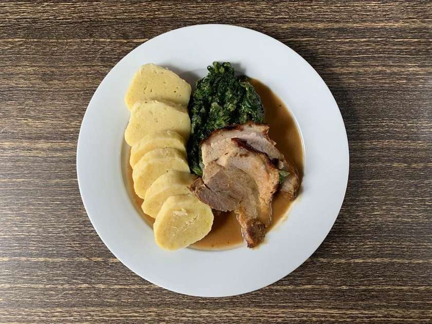 Baked country style pork brisket, spinach, potato dumplings