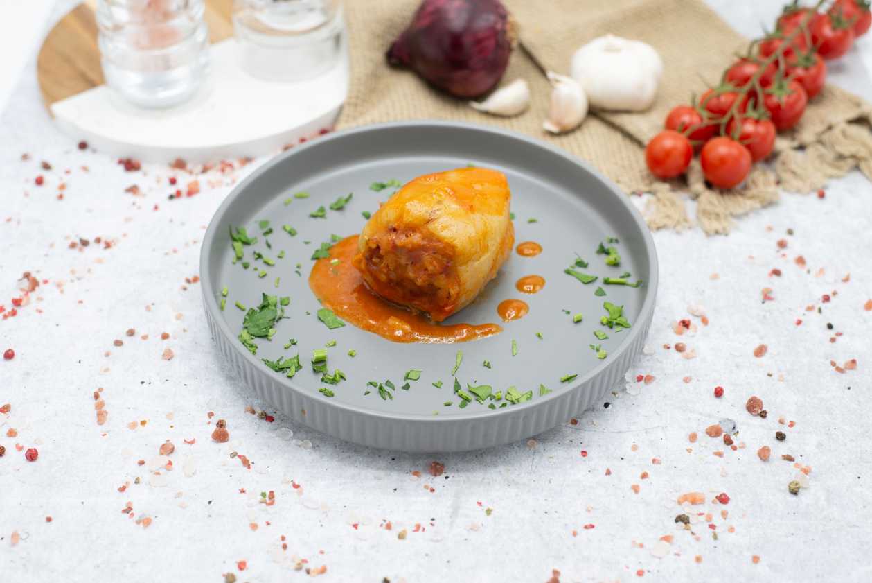 Peppers stuffed with meat and tomato sauce