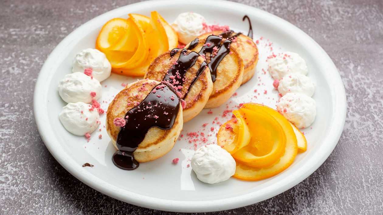 American pancakes with chocolate and fruit